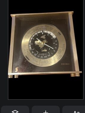 Rare Seiko Gold and Black World Time Desk/Wall Clock -operated by battery